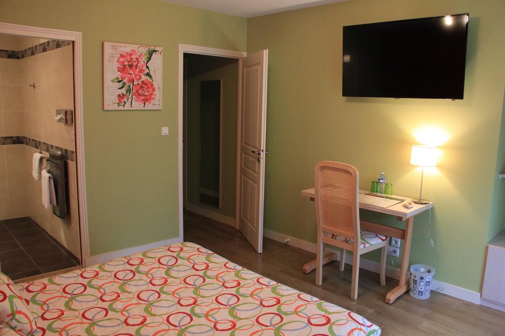 L'Amphitryon Hotell Coudray  Rum bild