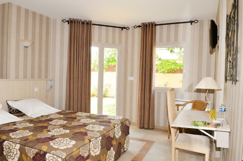 L'Amphitryon Hotell Coudray  Rum bild
